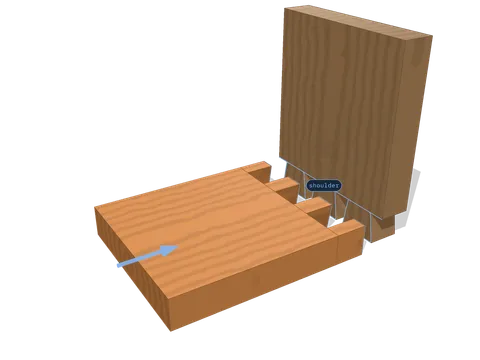 The pin board part way onto the tails, travelling along the insertion axis.